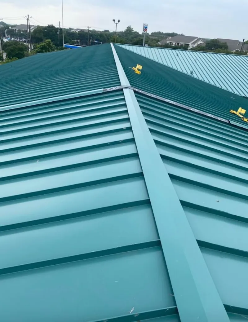 Green commercial metal roof ridge and valley for Metal Roof Repair in North Berwick
